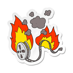 sticker of a cartoon movie film burning