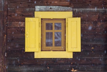 Fototapeta na wymiar rural house yellow window frame