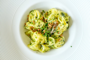 Pasta stuffed with gorgonzola and pear with pesto