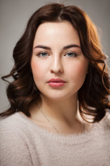 Brunette girl with day nude female face makeup.