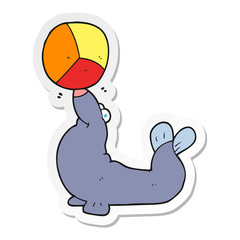 sticker of a cartoon seal balancing ball
