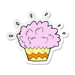 sticker of a cartoon exploding cupcake