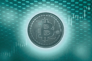Bitcoins and New Virtual money concept. Green bitcoin with Candle stick graph chart and digital background.
