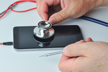 Smartphone and stethoscope. Diagnostic, repair and service.
