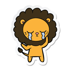 sticker of a crying cartoon lion