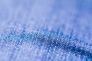 a line in blue jeans, macro shot