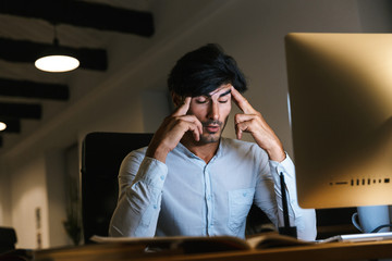 Portrait of a confident concentrated businessman working