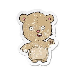 retro distressed sticker of a cartoon teddy bear
