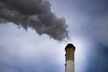 Air pollution. Harmful emissions. Bad ecology. Smoke from factory pipeDirty smoke on the sky,...