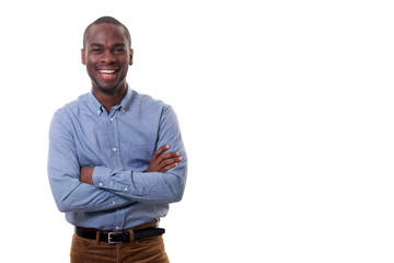 happy young businessman smiling against isolated white background