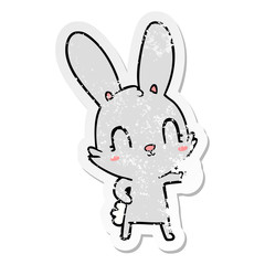 Fototapeta na wymiar distressed sticker of a cute cartoon rabbit