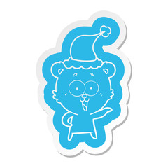 laughing teddy  bear cartoon  sticker of a wearing santa hat