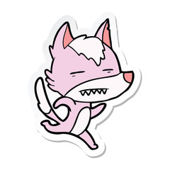 sticker of a cartoon wolf running showing teeth