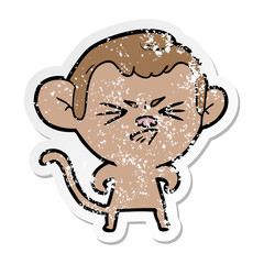 distressed sticker of a cartoon annoyed monkey