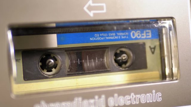 Insert an Audio Cassette into a Tape Player and Playback