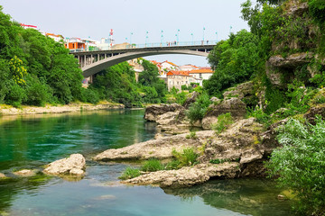 Fototapeta premium Mostar, Bosnia and Herzegovina. View of the bridge and the city.