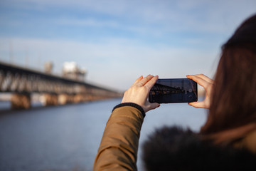 Kiev, Ukraine - March 01, 2019: Brand new Samsung Galaxy S10. Girl taking photo.