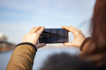 Kiev, Ukraine - March 01, 2019: Brand new Samsung Galaxy S10. Girl taking photo.