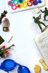 Vertical layout of teen boy's hobby for swimming, chess, music