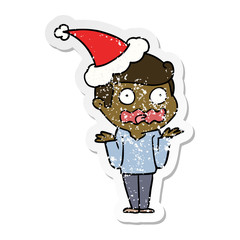 distressed sticker cartoon of a man totally stressed out wearing santa hat