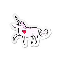 retro distressed sticker of a cartoon unicorn