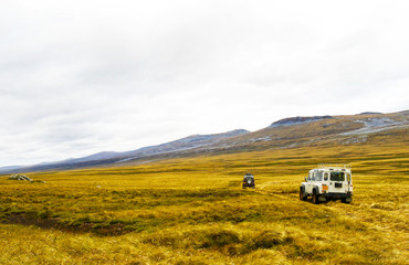 Off-road Vehicle Excursion over some Patagonian grasslands, in the Falkland Island. Popular Tourists Attraction.