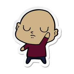 sticker of a cartoon bald man