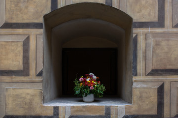Niche in the wall with flowers