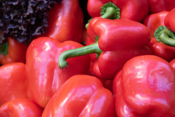 Delicious and fresh red Capsicums or red pepper vegetables on a fruit market