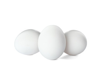 Few raw chicken eggs on white background