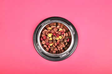 Flat lay composition with accessories for dog and cat, dry food, biscuits, cookies, pet food.