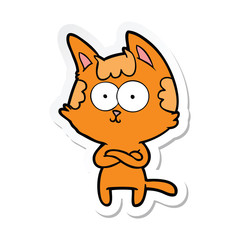 Obraz na płótnie Canvas sticker of a happy cartoon cat with crossed arms