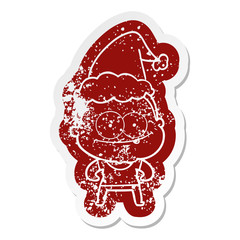 cartoon distressed sticker of a happy old woman wearing santa hat