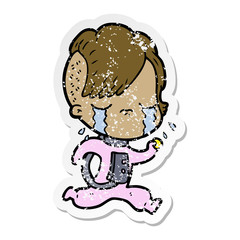 Fototapeta premium distressed sticker of a cartoon crying girl