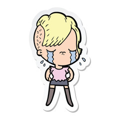 sticker of a cartoon crying girl