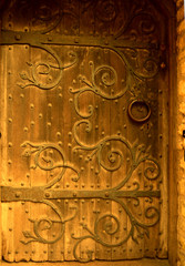 A hand forged historic hinge at a chapel