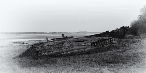 Fototapeta na wymiar ships and barges at the Purton Ships graveyard
