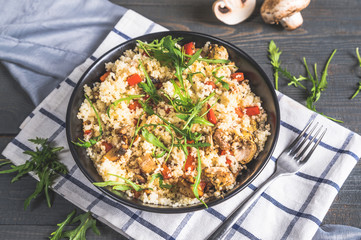 Bowl with couscous and vegetables