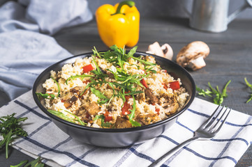 Bowl with couscous and vegetables