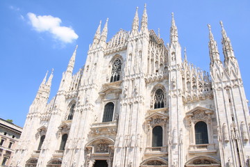 Fototapeta na wymiar The amazing Milan Cathedral, Duomo di Milano, the largest Gothic cathedral in the world and Vittorio Emanuele gallery in Square Piazza Duomo, Italy