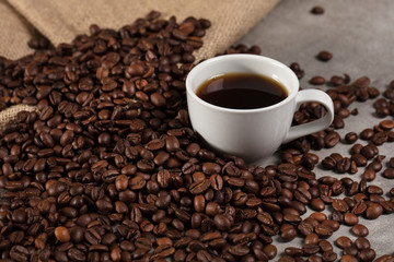 Coffee beans and cup