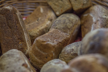 dietary natural whole grain bread in a wicker basket at a fair of healthy lifestyle