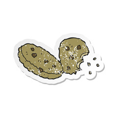 retro distressed sticker of a cartoon cookies