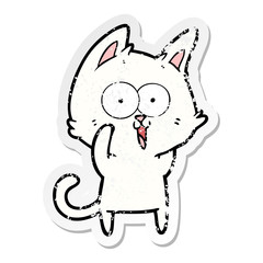 distressed sticker of a funny cartoon cat