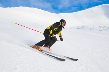 Skier in mountains