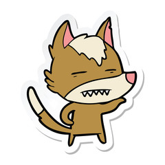 sticker of a cartoon wolf showing teeth
