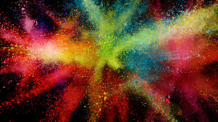 Explosion of colored powder on black background