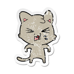distressed sticker of a cartoon hissing cat
