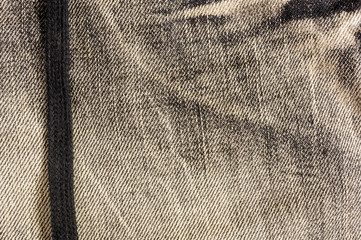 Black washed faded jeans texture with seams