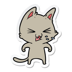sticker of a cartoon cat hissing